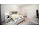 This bedroom features a full bed with decorative pillows, neutral decor, and carpeted floors at 2030 Lanza Dr, Charlotte, NC 28215