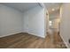 Spacious living room features hardwood floors, neutral paint colors, and natural light at 2206 Silverbell Ln, Stanley, NC 28164