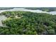 Aerial view of lush, green neighborhood next to a lake at 222 Riverview Ter, Clover, SC 29710