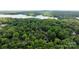 Enjoy life in this cozy lakeside community surrounded by lush greenery at 222 Riverview Ter, Clover, SC 29710