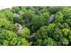 An aerial view of a community with mature trees and well-manicured lawns at 222 Riverview Ter, Clover, SC 29710