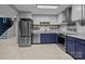 Beautiful kitchen features stainless steel appliances and two-tone cabinets with white countertops at 222 Riverview Ter, Clover, SC 29710