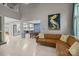 Open-concept living space boasts sleek floors, and integrates seamlessly with the adjacent kitchen and dining area at 222 Riverview Ter, Clover, SC 29710