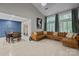 Inviting living room with vaulted ceilings, large windows, and a comfortable sofa provides a bright, airy space at 222 Riverview Ter, Clover, SC 29710