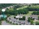 Aerial view of the clubhouse, golf course, and surrounding neighborhood offering a glimpse of community amenities at 27037 Tidal Way, Tega Cay, SC 29708