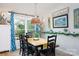 Dining room features a pendant light, window, decor and an inviting eating space at 27037 Tidal Way, Tega Cay, SC 29708