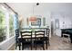 Bright dining area with natural light and a decorative chandelier at 27037 Tidal Way, Tega Cay, SC 29708