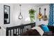 Stylish decor on the second floor landing area with hanging plants and electric guitars at 27037 Tidal Way, Tega Cay, SC 29708