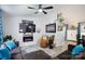 Cozy living room with a modern fireplace and comfortable seating at 27037 Tidal Way, Tega Cay, SC 29708