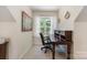 Bright office space with a wooden desk, perfect for remote work or study at 2804 Pulaski Dr, Monroe, NC 28110