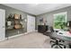 Bedroom featuring neutral walls, carpet, a desk, and a window with natural light at 3615 Alamito Ln, Charlotte, NC 28214