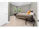 Cozy bedroom with neutral tones, natural light, and simple decor at 3615 Alamito Ln, Charlotte, NC 28214