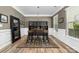 Dining room with stylish lighting, wood floors, and elegant decor at 3615 Alamito Ln, Charlotte, NC 28214