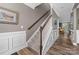 Inviting foyer with staircase and stylish decor, leading to the living areas at 3615 Alamito Ln, Charlotte, NC 28214