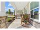 Inviting front porch with rocking chairs, offering a cozy outdoor space at 3615 Alamito Ln, Charlotte, NC 28214