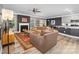 Inviting living room with a fireplace, comfortable seating, and open access to the kitchen at 3615 Alamito Ln, Charlotte, NC 28214