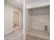 Functional laundry room featuring tiled floors, washer/dryer hookups, and easy access from the hallway at 4213 Summit Woods Dr, Charlotte, NC 28216