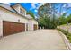 This large driveway provides ample parking with a well manicured garden at 4523 Fox Brook Ln, Charlotte, NC 28211
