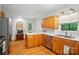 Traditional kitchen featuring stainless appliances, hardwood floors and white countertops at 4647 General Pershing Dr, Charlotte, NC 28209