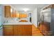 Classic kitchen featuring stainless steel appliances and hardwood floors at 4647 General Pershing Dr, Charlotte, NC 28209