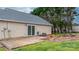 Home exterior featuring a wooden deck, sliding glass doors, and a cozy fire pit area at 5052 Swinging Bridge Rd, Conover, NC 28613