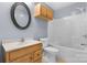 This bathroom offers a vanity sink, toilet, and a shower-tub combo with good lighting at 5052 Swinging Bridge Rd, Conover, NC 28613