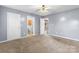 Spacious bedroom showing closet door, and a doorway to the bathroom and to another room at 5052 Swinging Bridge Rd, Conover, NC 28613
