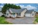 Inviting single-Gathering home with a turquoise door and well-maintained landscaping at 5052 Swinging Bridge Rd, Conover, NC 28613