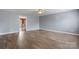 Spacious living room with hardwood floors and neutral paint, creating a cozy atmosphere at 5052 Swinging Bridge Rd, Conover, NC 28613