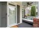 Inviting front porch with a cozy porch swing, perfect for relaxing outdoors at 5663 Morris Hunt Dr, Fort Mill, SC 29708