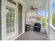 Charming covered front porch with comfortable seating, offering a relaxing outdoor space at 5663 Morris Hunt Dr, Fort Mill, SC 29708