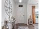 Stylish entryway featuring a console table, decorative accents, and a large wall clock at 6381 Trinity Crossing Cir, Kannapolis, NC 28081