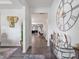 Inviting entryway with a large wall clock and decorative accents at 6381 Trinity Crossing Cir, Kannapolis, NC 28081