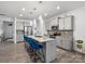 Spacious kitchen with a large island, granite countertops, stainless steel appliances, and plenty of cabinet space at 6381 Trinity Crossing Cir, Kannapolis, NC 28081