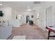 Spacious open living area with neutral walls, carpet, modern furnishings, and ample natural light at 6381 Trinity Crossing Cir, Kannapolis, NC 28081