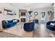 Inviting living room with a fireplace, comfortable seating, and elegant decor at 6381 Trinity Crossing Cir, Kannapolis, NC 28081