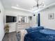 Bright main bedroom featuring stylish decor and a large dresser with a mirror at 6381 Trinity Crossing Cir, Kannapolis, NC 28081