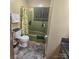Full bathroom with a shower and tub, toilet, and towel rack at 6573 Weldon Nw Cir # 22, Concord, NC 28027