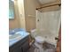 Bathroom featuring a walk-in shower, neutral-colored walls and flooring, and updated vanity at 6573 Weldon Nw Cir # 22, Concord, NC 28027