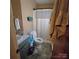 Compact bathroom featuring a shower, toilet, and vanity sink at 6573 Weldon Nw Cir # 22, Concord, NC 28027