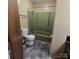 Bathroom featuring a single sink vanity and a shower at 6573 Weldon Nw Cir # 22, Concord, NC 28027