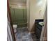 Bathroom featuring a single sink vanity and a shower at 6573 Weldon Nw Cir # 22, Concord, NC 28027