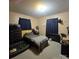 Neutral colored bedroom with a dark wood dresser and black out curtains at 6573 Weldon Nw Cir # 22, Concord, NC 28027