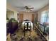 Traditional dining room featuring a ceiling fan, area rug, and table with seating at 6573 Weldon Nw Cir # 22, Concord, NC 28027