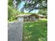 Charming brick home with a manicured front lawn and attached garage at 6573 Weldon Nw Cir # 22, Concord, NC 28027