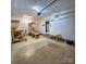 Spacious garage featuring an automatic door opener and ample room for storage and projects at 6573 Weldon Nw Cir # 22, Concord, NC 28027