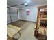 Garage featuring ample space, overhead door, and potential for storage or workspace at 6573 Weldon Nw Cir # 22, Concord, NC 28027