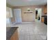 Kitchen area with tile floor and view to door to laundry room at 6573 Weldon Nw Cir # 22, Concord, NC 28027