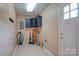 Functional laundry room with tile flooring, storage cabinets and utility sink at 6573 Weldon Nw Cir # 22, Concord, NC 28027