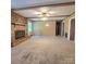 Spacious living room features a brick fireplace and ceiling beams at 6573 Weldon Nw Cir # 22, Concord, NC 28027